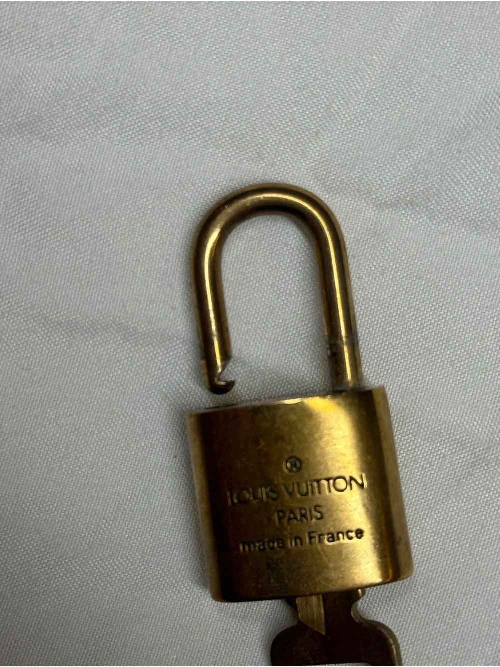 Louis Vuitton Gold Tone Monogram Padlock with Key # 300